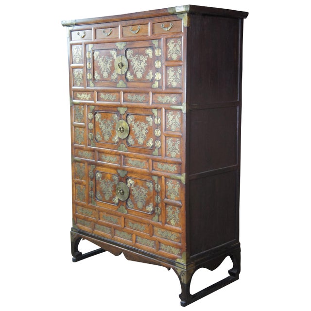Fine & Early 19th Century Korean Tansu Nong Bandaji tallboy wedding chests or cabinet made of elmwood featuring ornate...