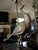 Introduce a beautiful, unique focal point to your home with these ornate metal peacock lamps. The silver-tone metal is...