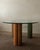 A vintage postmodern italian glass dining table with enamel-finished column base, made for saporiti italia and produced in...