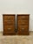 Some pieces carry the quiet evidence of a life lived in stages. This handsome pair of antique English oak nightstands...