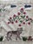 Hand-embroidered Suzani panel from Uzbekistan, worked in fine floss on a cream cotton ground. Three tigers move across the...