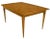 Elegant burled walnut and copper accented dining table. Slight boat style bow to the walnut bordered patchwork burled...