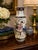 An elegant vintage Chinese porcelain vase executed in the famille rose tradition, featuring beautifully hand-painted...