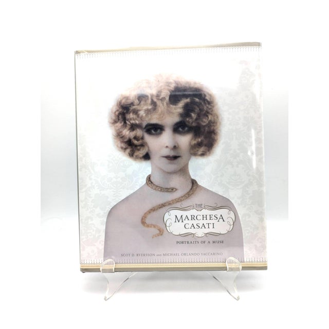 Offered is a first edition of The Marchesa Casati: Portraits of a Muse by Scot D Ryersson & Michael Orlando Yaccarino,...