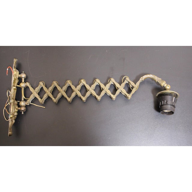 Scissor Wall Lamp in Bronze, 1930, in Very Good conditions. Designed 1920 to 1949 European Plug (up to 250V).The wiring of...