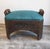 An exceptional 19th-century Folk Art carved oak footstool, featuring a beautifully detailed, hand-carved front facade...