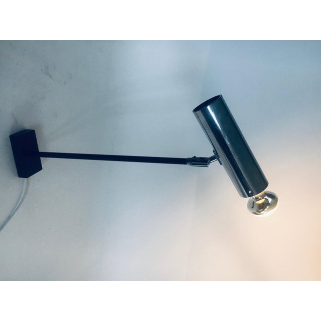 Vintage Midcentury Modern Design Chrome Spot Wall Lamp. Made in the 1960's, Germany. Chrome metal spot lamp with long...