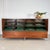 Crafted in Germany during the 1960s, this architectural display counter pairs rich mahogany veneer with a minimalist six-...