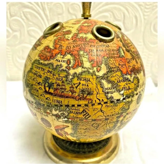 One of a kind Vintage mid century 1960’s Ancient Globe Paperweight Pen Holder that measures 6" tall.