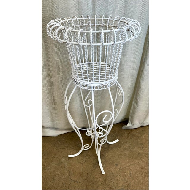 Palm Beach Estate Sale find. French handmade wrought iron plant stand. White paint finish.