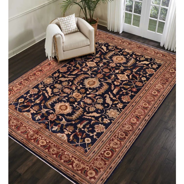 "Enhance the ambiance of your home with this magnificent Persian-influenced Turkish hand-knotted rug made by skilled...