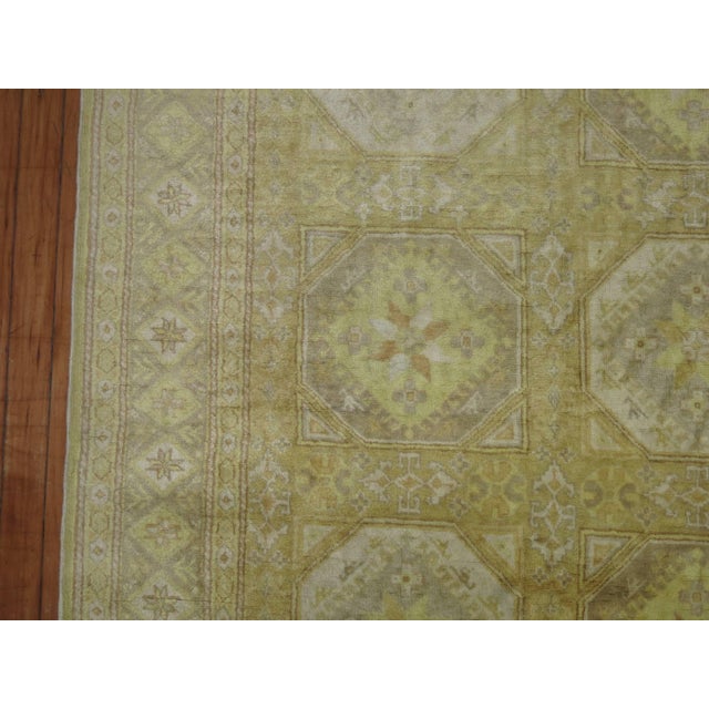 Silky sheen Turkish Kayseri rug with warm gold and yellow tones.