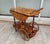 Italian bar trolley, Sorrento style, made of marquetry with floral inlays and brass details. It has two folding side wings...