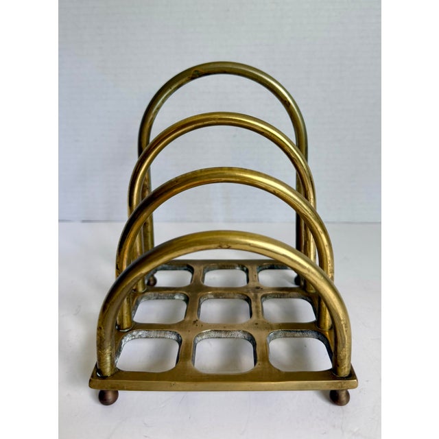 This stylish late 20th-century brass letter holder from Geary's Beverly Hills transforms an everyday desk accessory into a...
