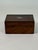 French 19th Century Box made of exotic rosewood The top and the keyhole of the petite trunk is inlaid with Mother of...
