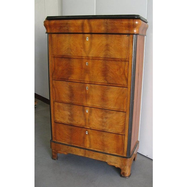 CODE 3841 Antique secretary-secretary. Mid-19th century Blonde mahogany secretary-secretary with flamed veneer front....