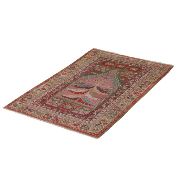 Hand-knotted in wool originating from Turkey circa 1880-1890, this 3x5 rug is a handmade antique Anatolian rug featuring...