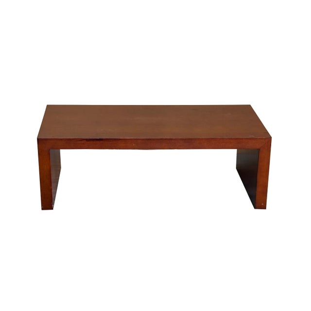 A simple plank wood rectangular nesting coffee table, finished in a rich brown tone. This minimalist table offer versatile...
