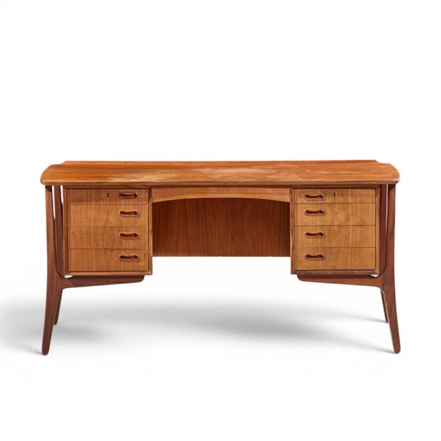 Svend Madsen Mid Century Danish Teak Curved Desk This desk measures: 60 wide x 29 deep x 28 high, with a chair clearance...