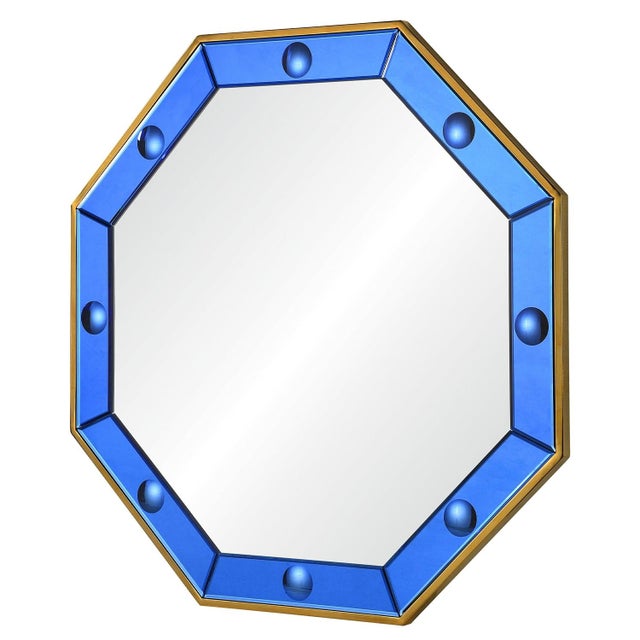 Designed by Bunny Williams. Octagonal polished brass mirror surrounded by hand cut blue convex mirrors. Non-beveled center...