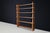 A sculptural mid-century Alpine bookcase in solid wood, featuring traditional wedge joinery and a fully demountable...