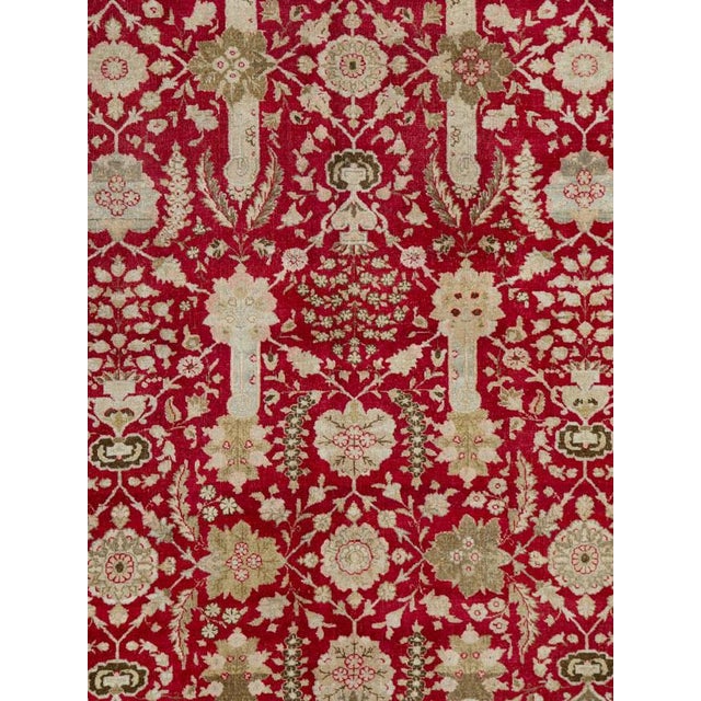This early 20th-century Persian Afshar accent rug presents a richly patterned allover composition across a vivid red...