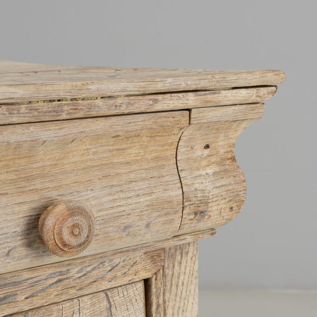 1880s French Gustavian Oak Chest of Drawers. This understated chest exemplifies the Gustavian styles emphasis on balance,...