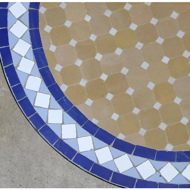 100 % glazed round. Moroccan mosaic table measuring approximately 24" in diameter and 29" hight. For both indoors and...