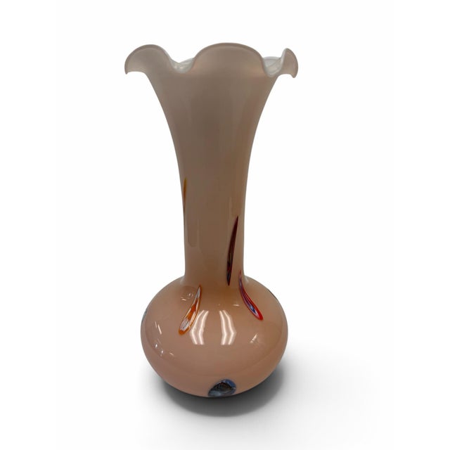 Elevate your interior styling with this striking vintage mid-century modern cased art glass vase, handcrafted in Italy by...