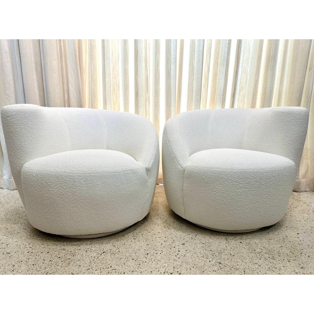 Newly reupholstered in a soft and nubby bouclé, these 'Corkscrew' swivel chairs, also often referred to as 'Nautilus', by...