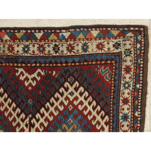 Antique Kazak Handmade Wool Geometric Gold, Ivory, Navy & Light Blue Rug For Sale - Image 4 of 10