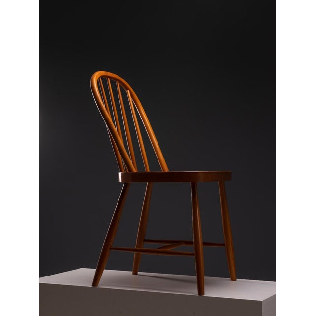 This set of four dining chairs dates from the 1960s–1970s and reflects the light, functional aesthetic associated with...