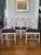 Set of four rattan side chairs or dining chairs designed by breakthrough innovator Elinor McGuire in the California...