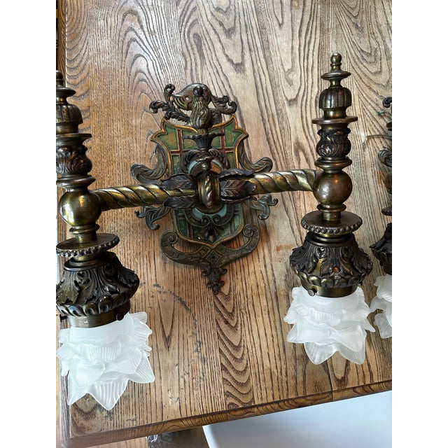 Old Lights On is pleased to offer this awesome pair of Spanish Revival bronze wall sconces, with flower shades....