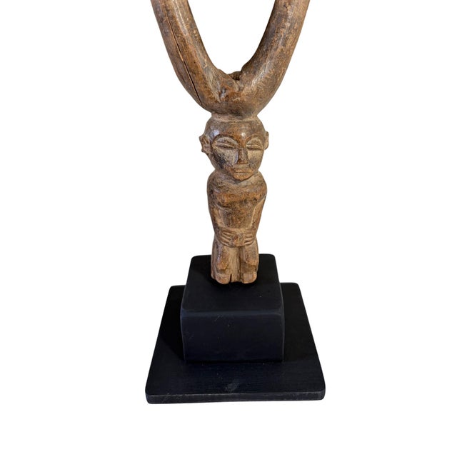 Superb vintage Lobi figural slingshot from Burkina Faso, depicting a united couple with remarkable artistry and patina....