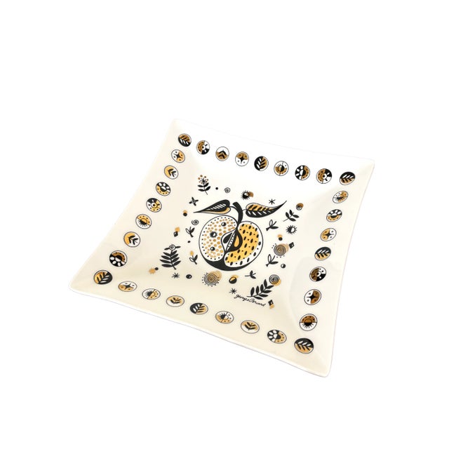 Add a touch of mid-century charm to your home with this vintage Georges Briard "Forbidden Fruit" glass serving tray....