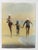 Early 20th century colortone advertising photograph of two women and a young girl in swimsuits runningalong the beach....