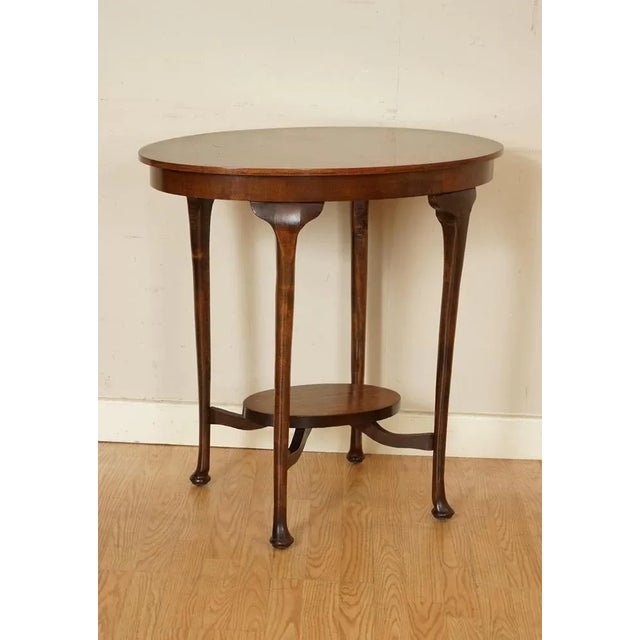 Lovely Vintage Oval End Table. Please carefully look at the pictures to see the condition before purchasing as they form...