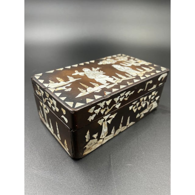 Vintage Chinese inlaid Mother of Pearl black lacquer - over wood - rectangular box. Chinoiserie boxes date back to late...