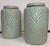 Ceramic ginger jars feature a celadon glaze and Ginko leaf motif. Ginko leaf design around entire jar. Flat 1 inch high...