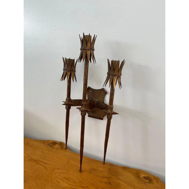 Three Pronged Wall Sconce . Possibly Spanish Based on Research. Spiked Poles That’s are pointed at the bottom. Back Plate...