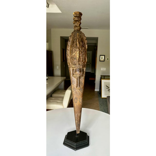 An antique Baga anok or elek carved wood mask sculpture, with bird and human face form elements, made by Baga people...