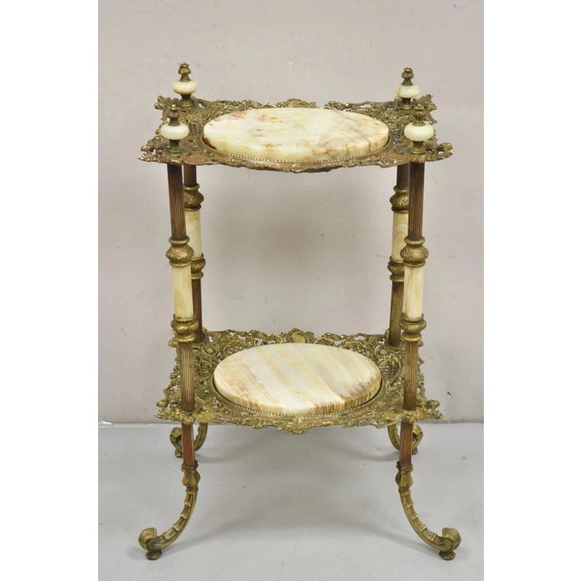 Antique French Victorian Bronze 2 Tier Onyx Stone Plant Stand Accent Side Table. Item features a bronze figural frame with...