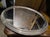 Art deco serving tray in aluminum and mirror. Scratches on the mirror. 3 feet under the top to place it. Diameter 42 cm,...