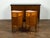 A pair of Italian walnut demilune bedside tables from the early 19th century, with tambour doors and single drawers....