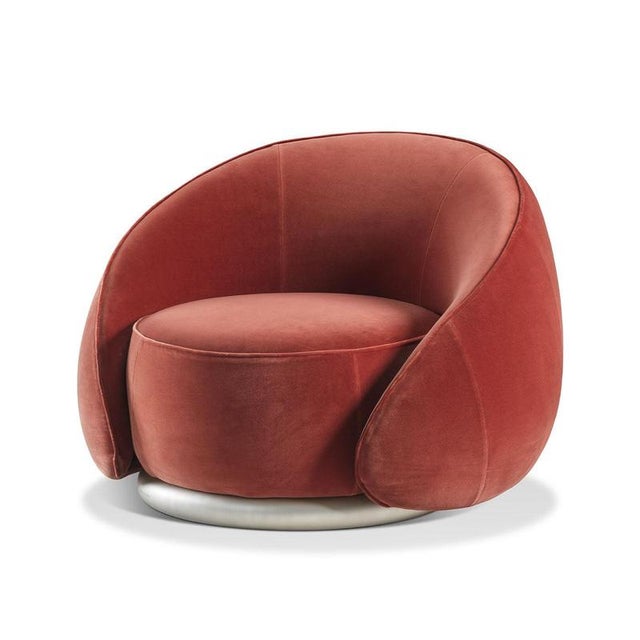 A sculptural seat with an enveloping silhouette, this round armchair by Lorenza Bozzoli balances soft comfort with a...