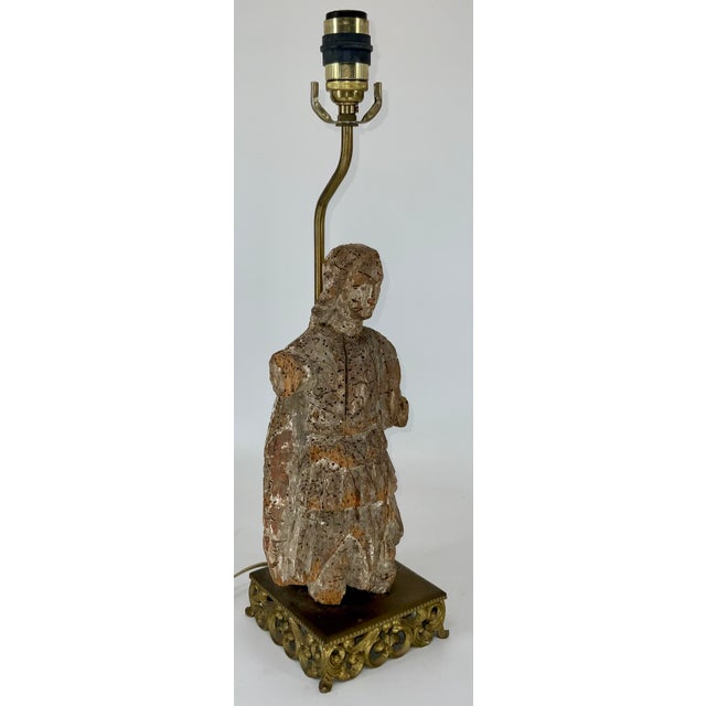 Incredible 17th or 18th century carving made into table lamp in the beginning of 20th century . Figure is 13” tall .