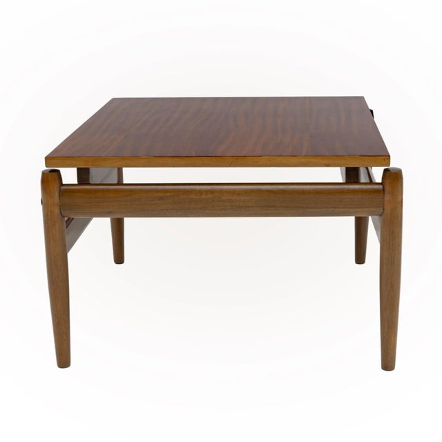 Italian coffee table from the early 1960s in solid wood and poplar veneer top, completely restored and polished with shellac.