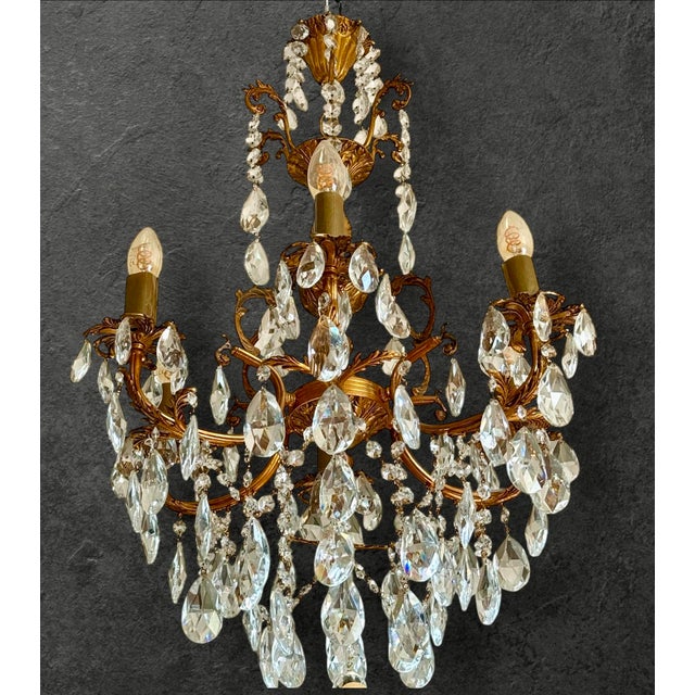 Antique French Gilt Bronze and Crystal Chandelier, circa 1900 Elegant and slender antique French chandelier dating from...