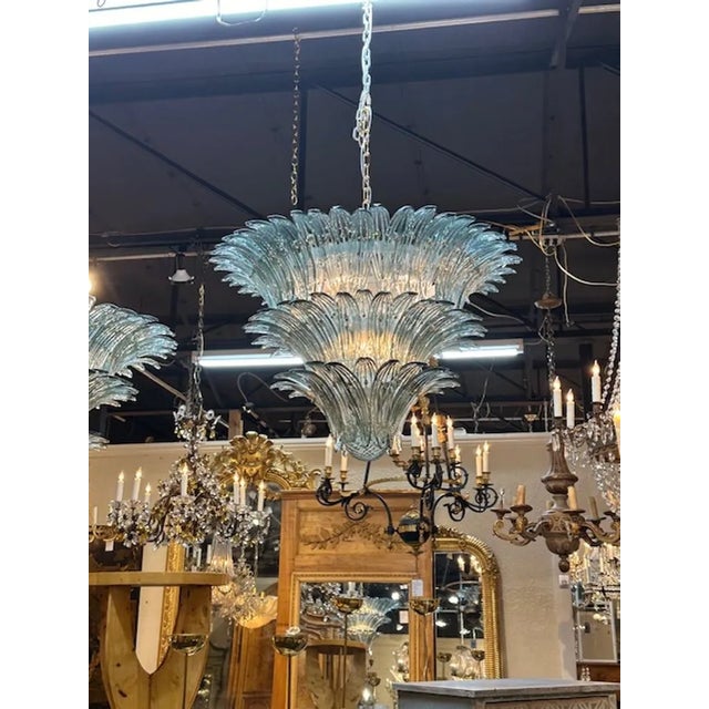 Gorgeous modern Murano glass "palmette" chandelier in Fontana Green. The chandelier has been professionally rewired, comes...